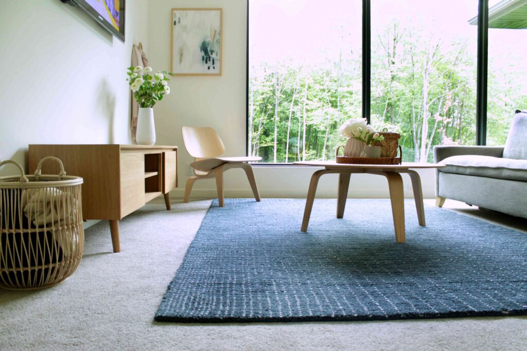 using-area-rugs-over-carpet-2908732-02-f3b860e039fd495e9fb1a0d598543102
